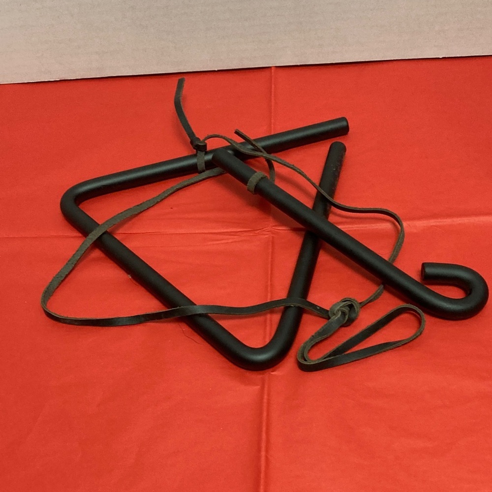 Triangular cast iron dinner bell hanging strap and striker lodge chuckwagon